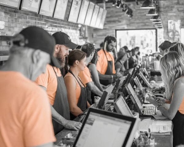Busy fast casual restaurant service line